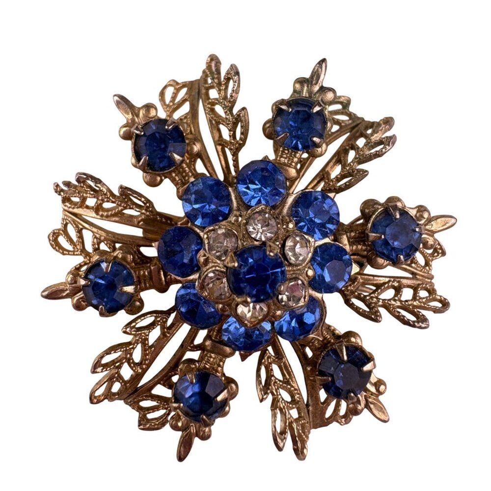 Vintage Unknown Blue Gold Tone Rhinestone Snowflake Brooch Resin Round Pin